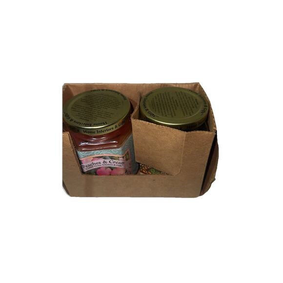 Home Interiors & Gifts jar candles.The scent are Peaches &CreamWoodland candles - Picture 4 of 5